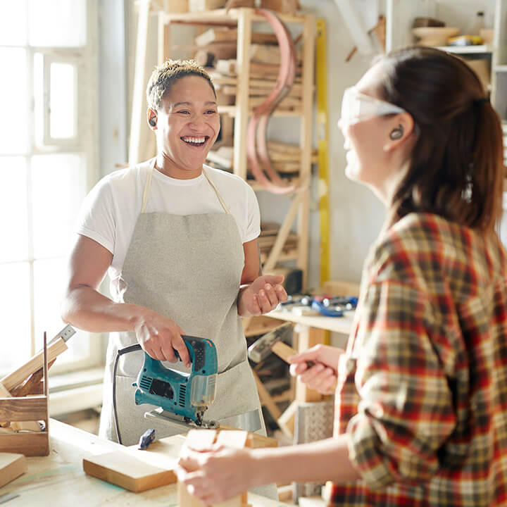 carpentry-allert-women-in-shop-laughing-square